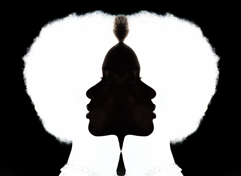 Profile silhouette portrait of african american woman. Rorschach test and psychology self projection reflection freedom