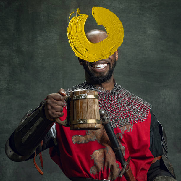 Armor of a medieval knight with a helmet with a feather