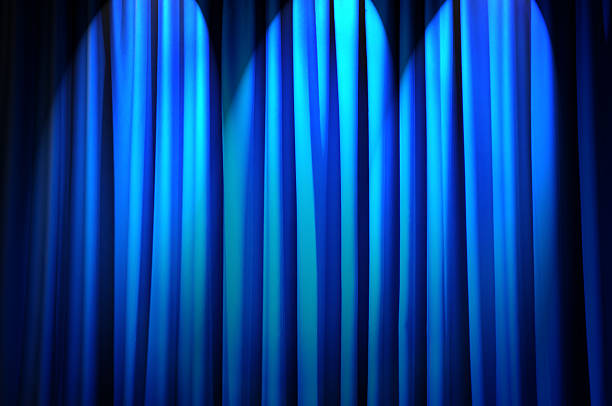 istock Brightly lit curtains in theatre concept 141103870