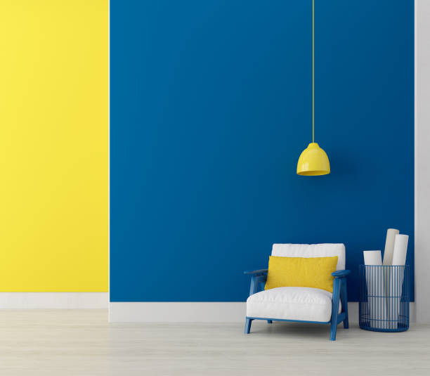 istock Modern interior room with armchair.Blue and yellow wall background.3d rendering 1411038781