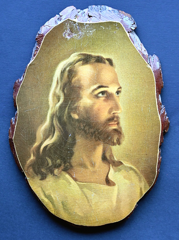 Painting of Jesus by Warner Sallman on piece of wood.