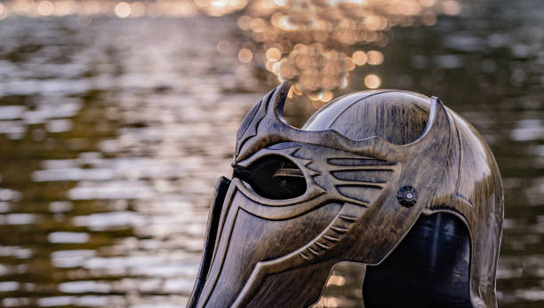 istock Metaphorical installation on a mountain river with a gladiatorial helmet 1411039865