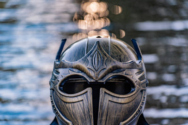 istock Metaphorical installation on a mountain river with a gladiatorial helmet 1411039937