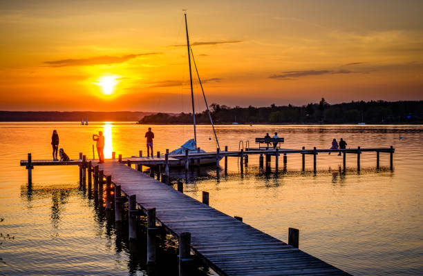 istock old wooden jetty at a bavarian lake 1411044689