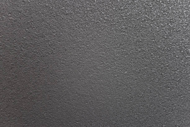 Surface pattern Coarse, uneven, natural colors, shades of gray and black.