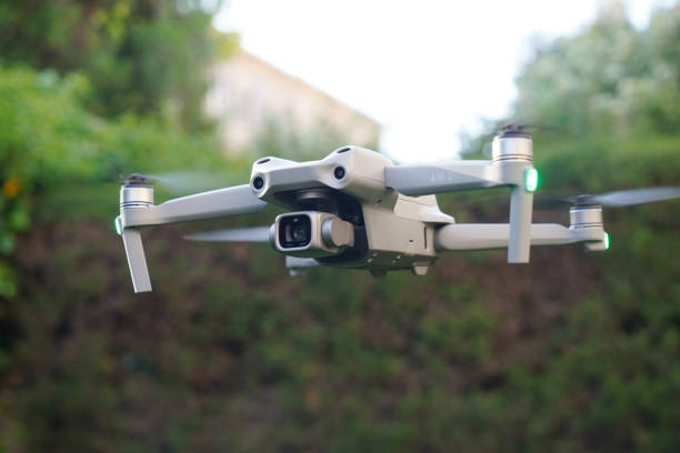 Spain; 05 20 2022 : Dji air 2s flying in the garden with sensors Spain; 05 20 2022 : Dji air 2s flying in the garden with sensors drone stock pictures, royalty-free photos & images
