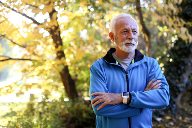 istock Senior man in a park 1411050022