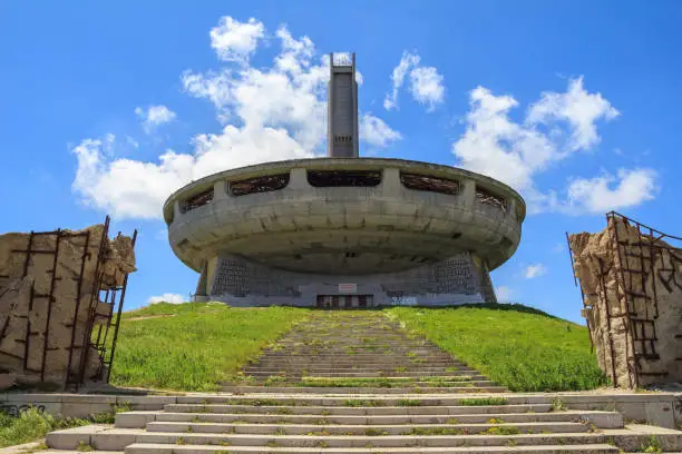 BUZLUDZHA PEAK, BULGARIA - JULY 06, 2019: Front view of UFO-shaped Buzludzha building