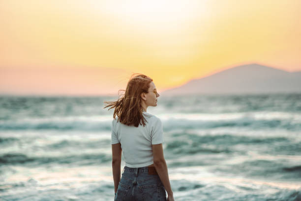 istock Watching the sunset always calms me 1411054026
