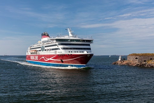 Helsinki, Finland- July 26, 2022: Viking Line ship XPRS arrives trough narrow Kustaanmiekka strait in Helsinki