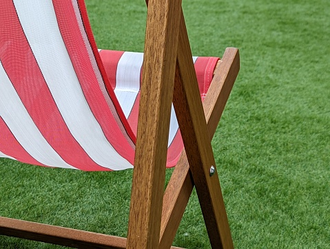 Deck chair and grass