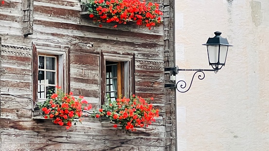 Mountain village house and lamp, seen in Vals, Graubunden