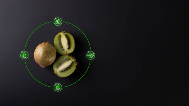 Kiwi is placed on a black background