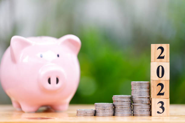 istock Money saving concept for new year 2023 with coins stacking 1411060689