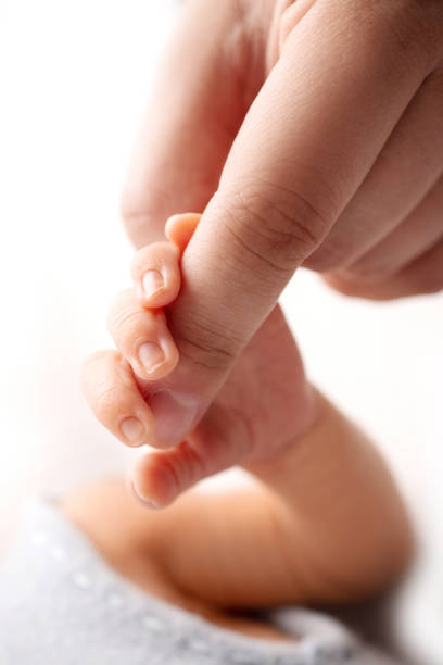 1,500+ Newborn In The Palm Of Fathers Hand Stock Photos, Pictures &  Royalty-Free Images - iStock