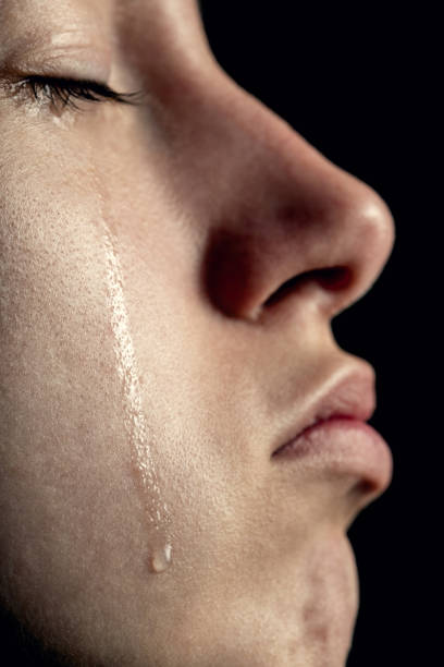 istock crying woman closeup 1411068019