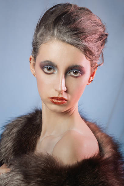 istock girl in fur 1411068248