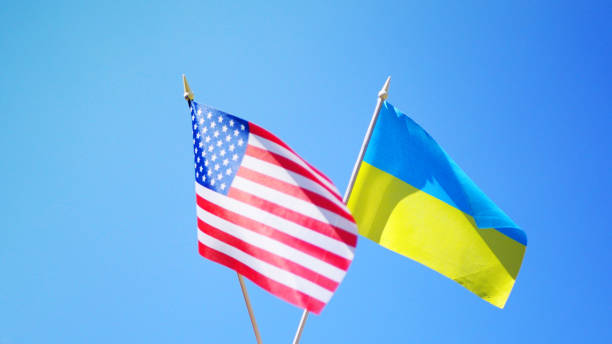 istock American and Ukrainian flags. 1411069961