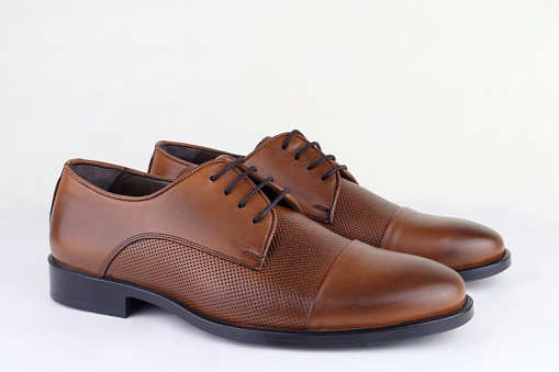 Brown Leather Shoes On White Background