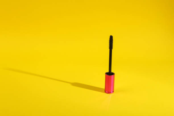 istock Mascara score on yellow background with long shadow 1411073254