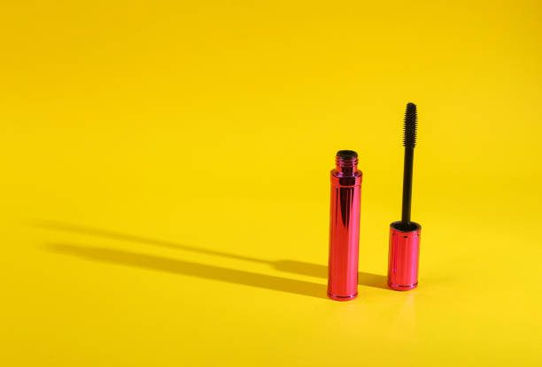 istock Mascara score on yellow background with long shadow 1411073256