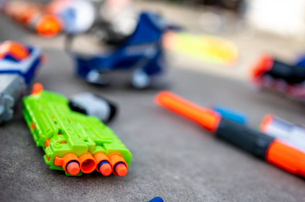 istock Soft foam dart gun loaded and ready for use by children. 1411077340