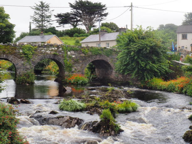 istock waterfall on the Owenglin river with stone bridge, in Clifden 1411077599