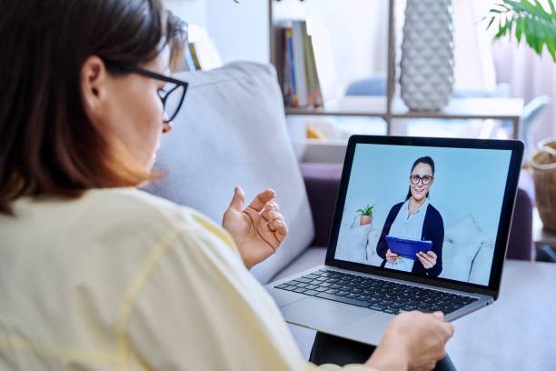 istock Business woman making video chat with client, partner in home office. 1411078880