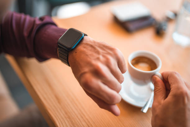 istock Young Businessman Working With His Smart Phone And Watch 1411083647