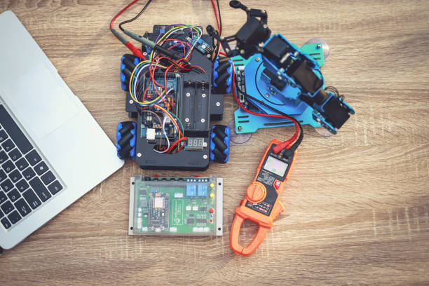 istock Top view of Robot KIT, Multimeter , Control board and laptop using to lean science and technology class 1411085571