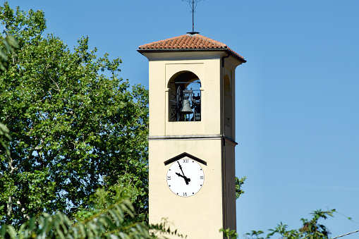 bell tower with clock at five to ten