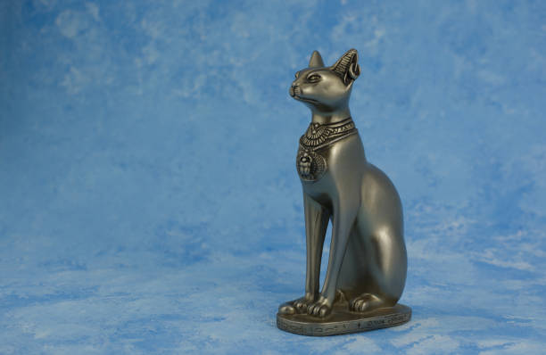 istock statue of Egypt cat on blue  background 1411089120