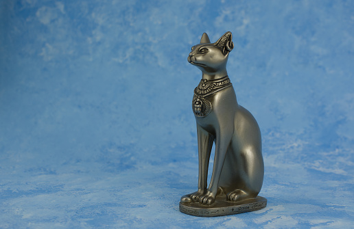 statue of Egypt cat on blue  background