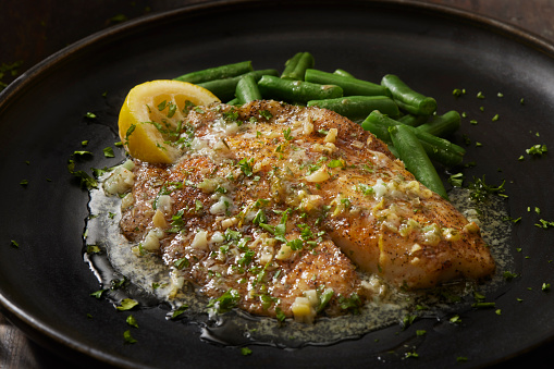 Baked Tilapia in a Lemon, Garlic and Butter Sauce with Steamed Green Beans