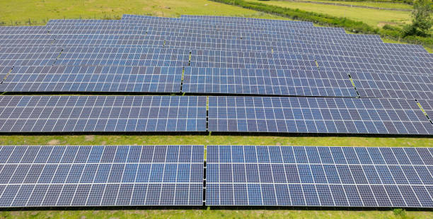 istock Aerial view of a solar panel farm. No people. 1411096476