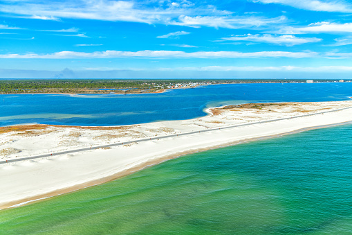 Aerial view of the Johnson Beach National Seashore located on Perdido Key in Pensacola, Florida - a natural parkland of sand dunes and wildlife between Pensacola Bay and the Gulf of Mexico.