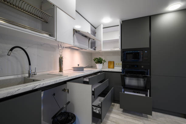 istock Modern simple trendy dark grey and white kitchen 1411104725