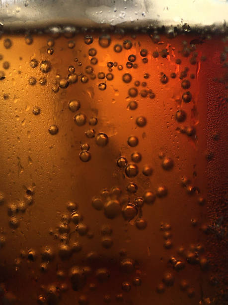 istock bubbles in a soft drink in a glass 1411107548