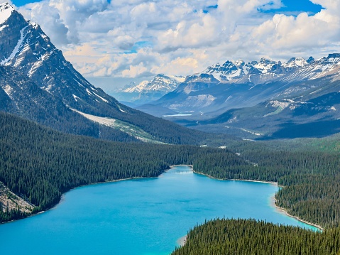 A glacial lake with a unique turquoise color in Banff National Park in the Canadian Rockies. The flow of glacial rock flour into the lake creates its spectacular color.