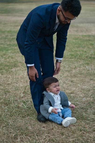 istock Young Asian Father playing with his infant son 1411115268