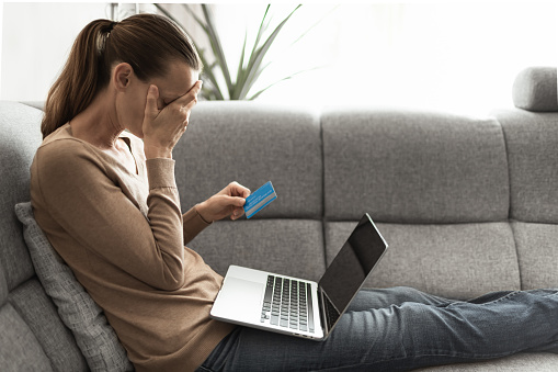 Woman under financial stress.