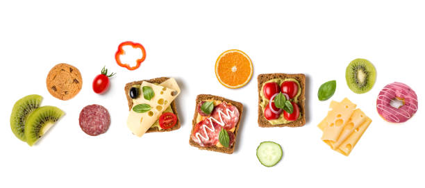 istock Breakfast concept. Fruits, toasts, cheese, fried egg isolated on white background. Flat lay, top view. 1411116068