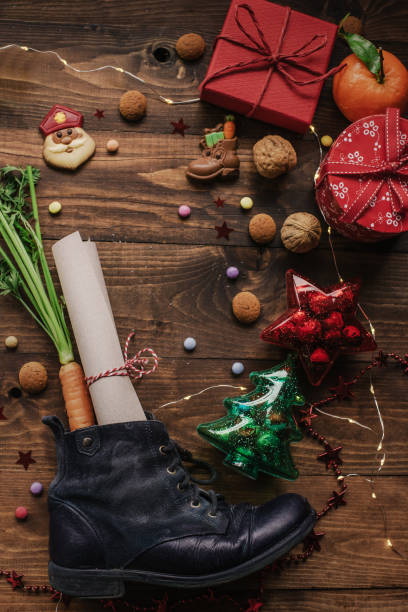 istock Saint Nicholas gifts and shoe 1411116193
