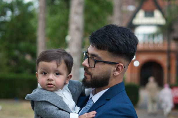istock Young Asian Father playing with his infant son 1411116273