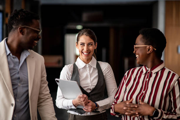 istock Multiracial young group of coworkers having a laugh at work 1411117376