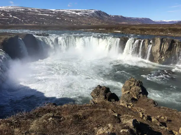 Goðafoss waterfall is located in the river Skjálfandafljót in north Iceland, the fourth-largest river in Iceland. It is one of the most spectacular waterfalls in the country, falling from a height of 12 meters (39 feet) over a width of 30 meters (98 feet).