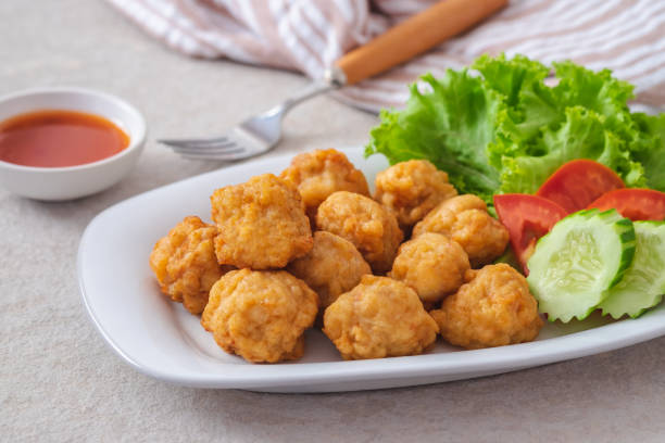 istock Deep fried shrimp ball and vegetable on plate 1411124867