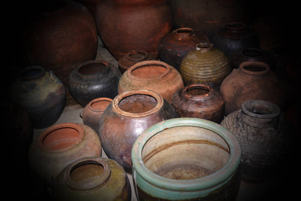 istock Various type of old thai hand made clay pottery. 1411131956