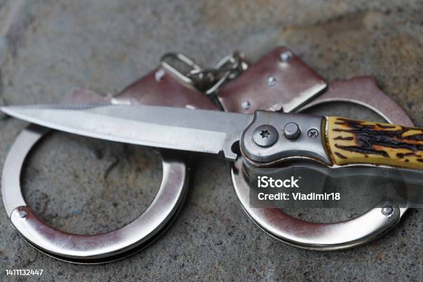 The Knife Is Handcuffed Crime Concept Stock Photo - Download Image Now - Customs, Order, Adult