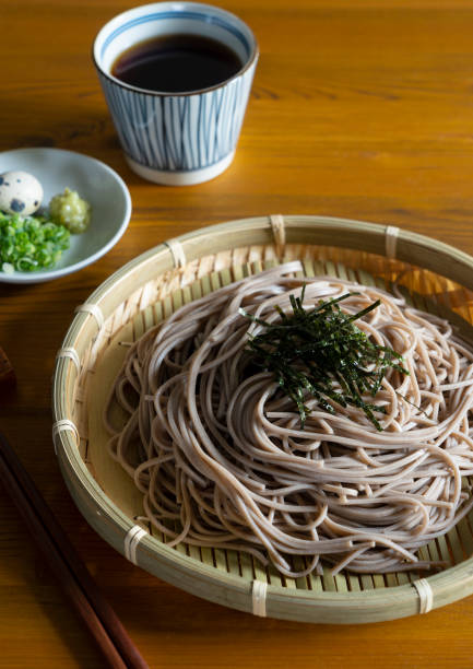 istock Zaru-soba and condiments on a wooden table. 1411133413